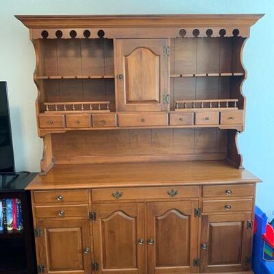 Sprague Carelton cabinet and hutch. Cabinet has 5 drawers on the bottom and on the top has an area to display items as well as hanging...