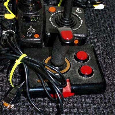 Vintage Atari Controllers.  Joystick, Paddle Controller, Gravis analog joystick for PC.