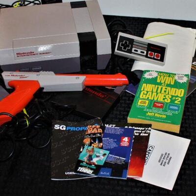 Nintendo 2 Console and Controllers.  Super Mario, Duck Hunt and Zapper,  Cables included.