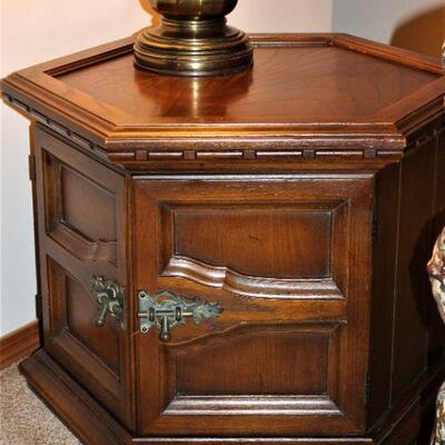 Matching dark oak end table also has plenty of style and lots of storage.
