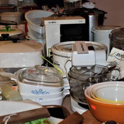 Cooking and baking necessities along with many kitchen appliances and gadgets.