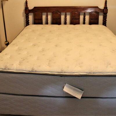 Queen sized spindled headboard, frame, box springs and mattress is in great condition.