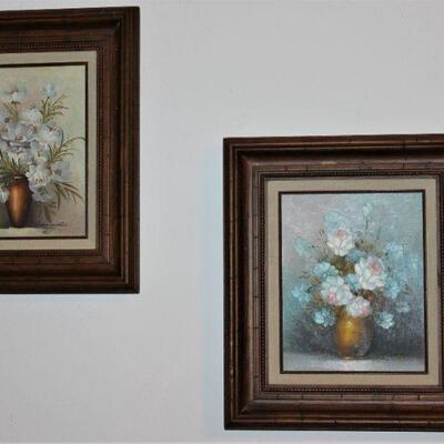 Framed floral artwork.