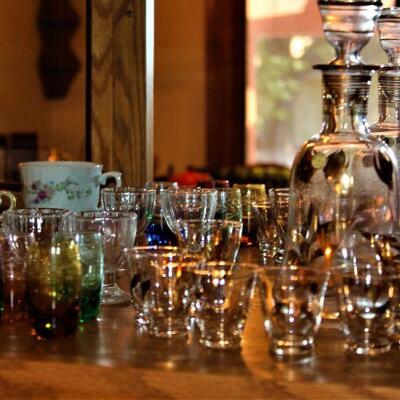 Italian decanter with gold rimmed shot glasses.  Attractive for any bar.
