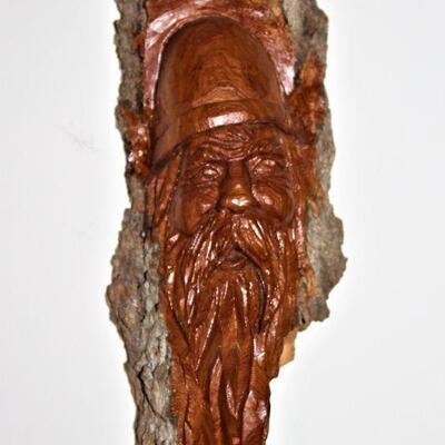 Wooden carved spirit face.