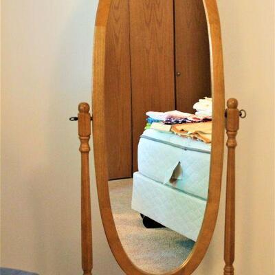 Oak full length swivel mirror.
