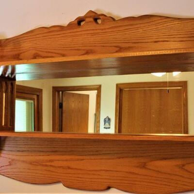 Back mirror oak display cabinet is perfect for collectibles.