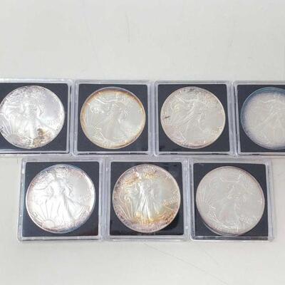 #1722 • 7 .999 Silver Walking Liberty Coins