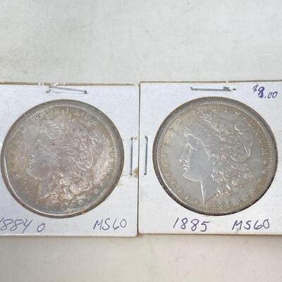 #1772 • 2 Morgan Silver Dollars
