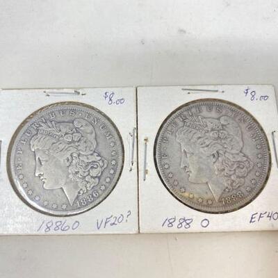 #1768 • 2 1882, 1879 Morgan Silver Dollars
