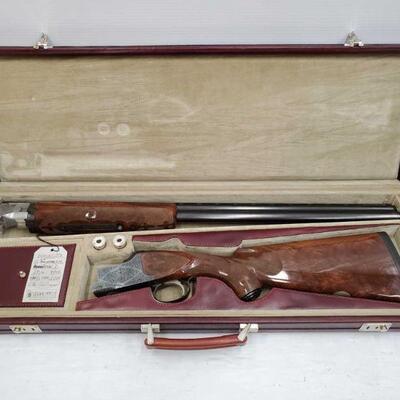 #702 â€¢ Winchester Model 101 25th Anniversary Silver Edition 40/101 12 GA Shotgun. Serial Number: W5A12-040E
Barrel Length: 28"...