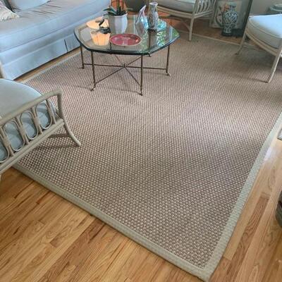 This is a wicker woven floor rug with the edges stitched with a heavy duty canvas material. Itâ€™s very rugged and feels well made. Does...
