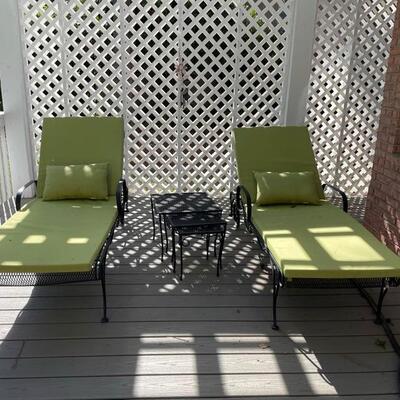 Two Iron chaise lounges in beautiful condition. Includes weather safe cushions and pillows for both (easily cleaned). Also includes a...