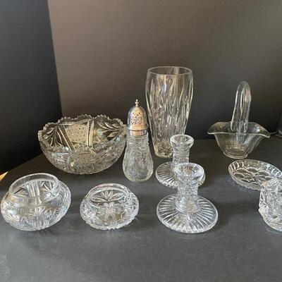 Vase, decanters, and a variety of drinking glasses. Sneak suspicion that the vase is Waterford but canâ€™t confirm....