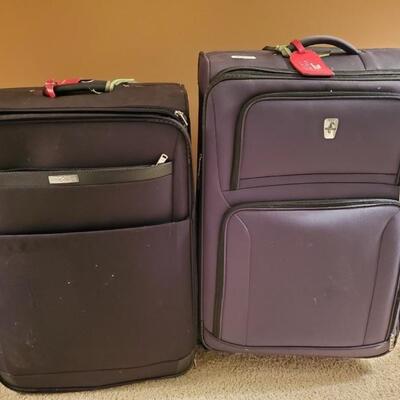 Set of 2 large black suitcases. Atlantic measures 21x12x31