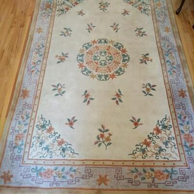 This is a beautiful hand woven Chinese rug. Measures 6'x9'. Make sure to see the two smaller matching rugs....