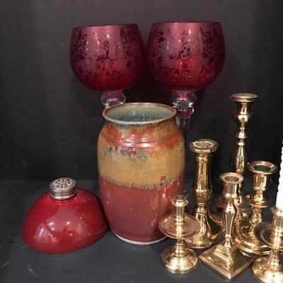 Red and khaki vase, two red candle holders, red vase and six brass candle holders. https://ctbids.com/#!/description/share/949889