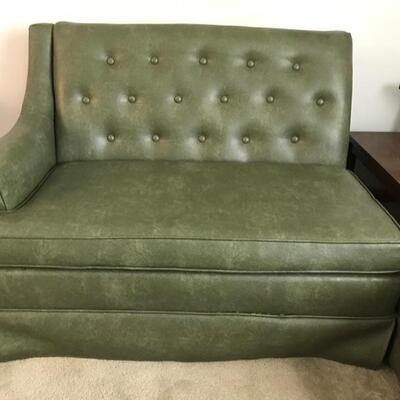 2 piece naugahyde sectional sofa $499
left with arm is 45