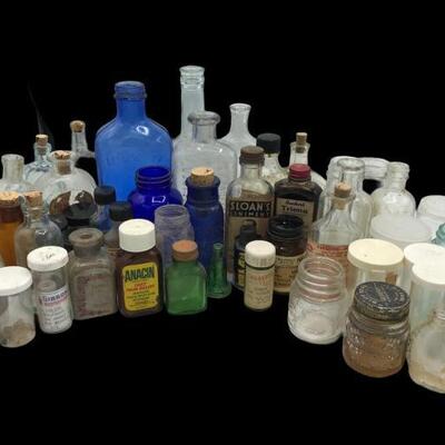 Check out these blast from the past collection of pill bottles jars. You will find a vintage Milk of Magnesia bottle, Listerine, Anacin...