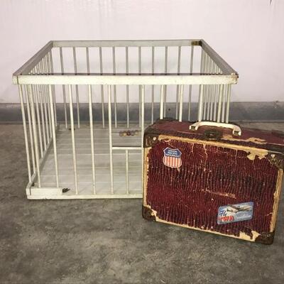 This lot contains a vintage playpen measuring 12” x 19” and a vintage children’s travel case with some stains on the inside. The playpen...