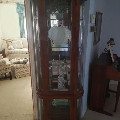 Curio cabinet, contents sold separately