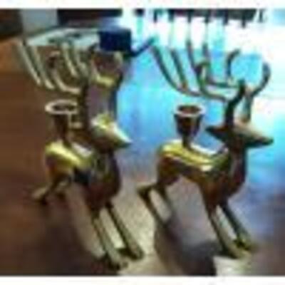 Pair of solid brass reindeer candle holders