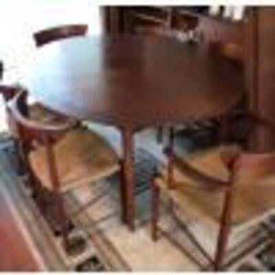Dining room table and six chairs, made in Denmark, the owner had it shipped back to the US. There are two other matching chairs, selling...
