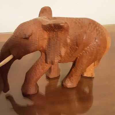 another of the three elephants, this one is hand carved wood