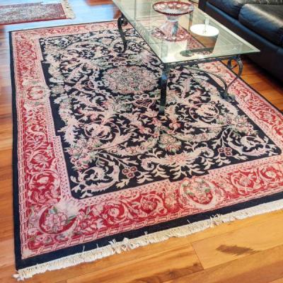 6 x9 wool area rug in black and reds