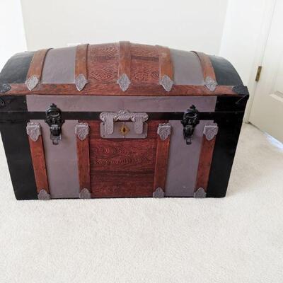 Dome top antique trunk