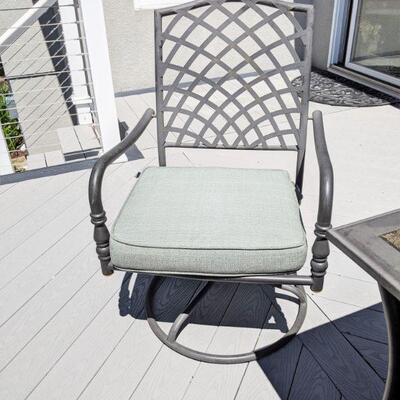 Swivel outdoor chair  - one of a pair that goes with the table and chairs 