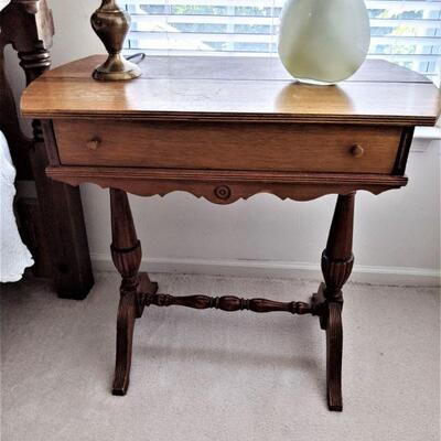 Antique occasional table with one drawer and stretcher base
