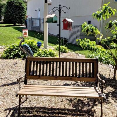 Wrought iron and wood outdoor bench