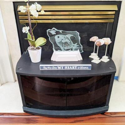Beach decor and elched glass fish on stand