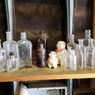 #1460 â€¢ Vintage Glass Bottles ranges in size from 3 x 1 - 7x3 inches. 