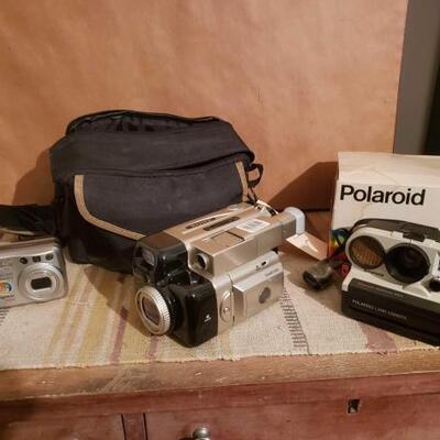 1340 â€¢ Sony Video Camera, Polaroid Camera, And Digimax Camera