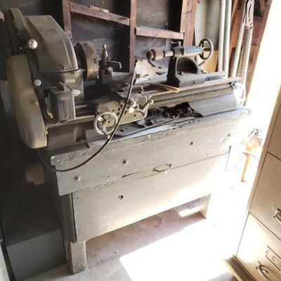 #1480 â€¢ Craftsman Lathe And Workbench measures approx 48 x 25 x 51 inches. 