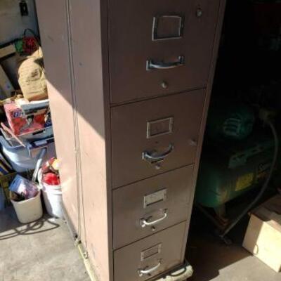 #1488 â€¢ Fire Proof Filing Cabinet And Furniture Dolly
 measures approx 30 x 17 x 54 inches. 