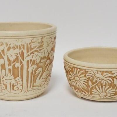 1076	2 UNMARKED POTS, ONE W/ SWANS, ONE W/ DAISIES, TALLEST IS 5 1/2 IN
