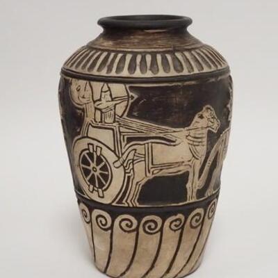 1069	BLACK & WHITE POTTERY VASE DECORATED W/CHARIOTS, 7 1/4 IN HIGH
