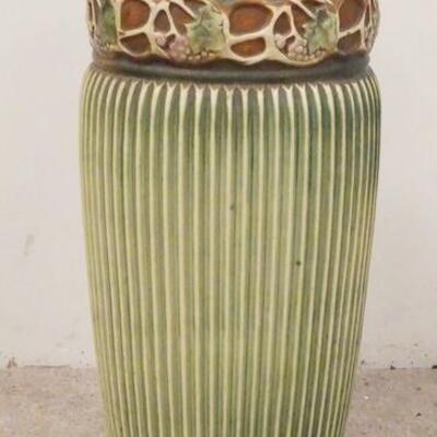1002	ROSEVILLE NORMANDY UMBRELLA STAND, HAS A 1 1/2 IN FLAKE UNDER THE RIM, 20 IN HIGH
