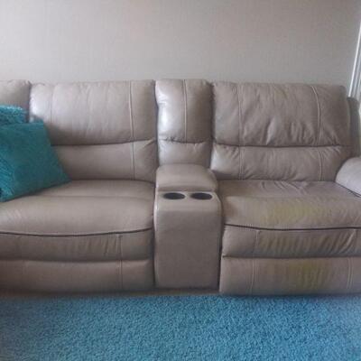 Medium leather L shape sofa $800 motorized 2 End recliners.