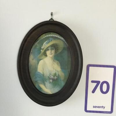 #70 Victorian style woman with floral hat.  Oval Frame measures 7" x 9". Priced at $22.