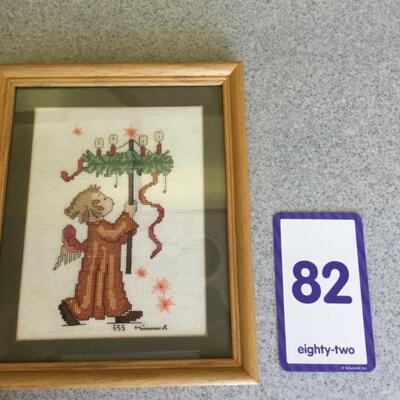 #82 Counted cross stitch.  Hummel carrying lights.  9" x 11" Priced at $15