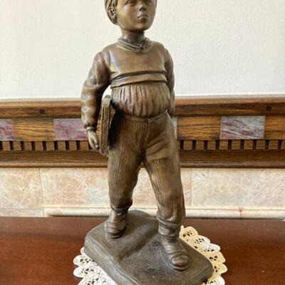 Bronze School Boy measures 15 1/2" tall.