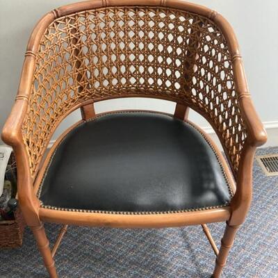 Rounded back caned chair with black leather seat.  Priced at $75