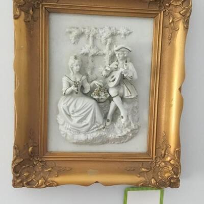 #32 Victorian Style 3 D Plaster. Man serenading Woman.  Frame Measures 12.5" x 14.5" Priced at $18