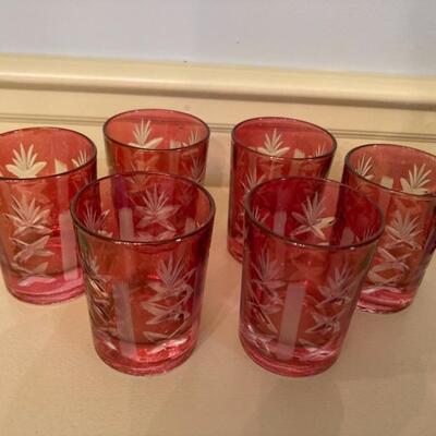 Set of 6 cranberry etched shot glasses.  Priced at $45.