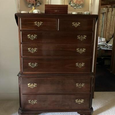 This Ethan Allen Chest on Chest has 7 drawers.  It measures 55
