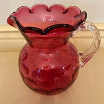 4.5" Cranberry Pitcher with handle.  Priced at $55.